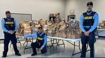 The Huron County Ontario Provincial Police (OPP) Auxiliary Unit held a successful "Stuff-a-Cruiser" food drive in Goderich. Photo from Huron OPP.