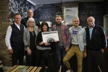 HDGH staff and Unifor members celebrate a donation to the Spiritual Soldiers sober bar, October 5, 2019. (Photo by Maureen Revait) 