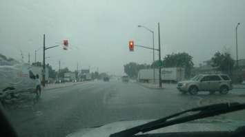 Huron Church Rd in Windsor under heavy rainfall on August 29, 2017. Photo by Mark Brown/Blackburn News.