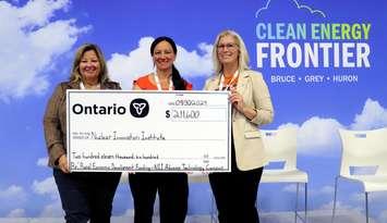 NII RED funding announcement.jpg – Lisa Thompson, MPP for Huron-Bruce and Minister for Rural Affairs (left), presents a cheque to the Nuclear Innovation Institute’s Stellina Williams, Vice President & CAO (centre) and Jessica Linthorne, President & CEO (right) at the 2024 Clean Energy Frontier Conference. Photo from NII