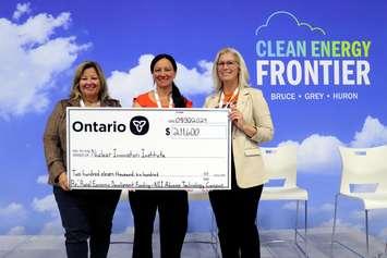 NII RED funding announcement.jpg – Lisa Thompson, MPP for Huron-Bruce and Minister for Rural Affairs (left), presents a cheque to the Nuclear Innovation Institute’s Stellina Williams, Vice President & CAO (centre) and Jessica Linthorne, President & CEO (right) at the 2024 Clean Energy Frontier Conference. Photo from NII