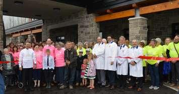 Supporters cut the ribbon to open Chapman House at Residential Hospice of Grey-Bruce in Owen Sound.
