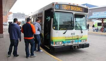 Detroit Tigers baseball fans board the Transit Windsor Tunnel Bus on Opening Day 2015, April 6, 2015. (Photo by Mike Vlasveld)