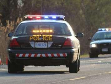 OPP cruiser with lights, daytime. Photo courtesy Ontario Provincial Police.