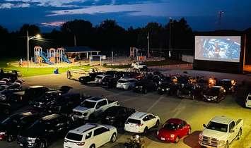 People watch a movie outdoors. Photo provided by the Township of Georgian Bluffs.