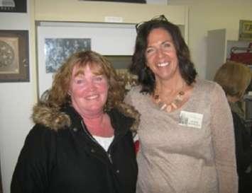 Kim Yake, (left) and Mount Forest Museum and Archives member Kate Rowley (right) at the grand reopening of the renovated Mount Forest Museum and Archives.
(photo by Campbell Cork) 