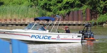 Chatham-Kent police and other first responders on the Thames River just west of the Third Street Bridge in Chatham. June 23, 2025. (Photo by Matt Weverink)