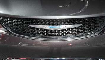 The front grille of the 2018 Chrysler Pacifica minivan at the North American International Auto Show in Detroit, January 15, 2018. Photo by Mark Brown/Blackburn News.
