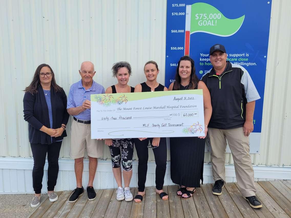 L-R: Amy Van Huss, the Development Officer for the Louise Marshall Hospital Foundation, accepts a cheque from George Forrest, Brandy Miller, Sheree Bell, Christa Cherrey, and Greg Shaw for the 2022 Mary Lynne Forrest Memorial Golf Tournament fundraiser for the hospital. August 31, 2022 (Provided by Amy Van Huss, Development Officer for the Louise Marshall Hospital Foundation)