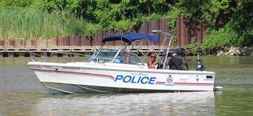Chatham-Kent police and other first responders on the Thames River just west of the Third Street Bridge in Chatham. June 23, 2025. (Photo by Matt Weverink)