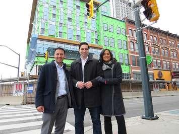 Attorney General of Canada Arif Virani, Parliamentary Secretary to the Minister of Housing Peter Fragiskatos, and Treasury Board of Canada President Anita Anand stand in front of YOU's affordable housing project Joan's Place in downtown London, April 2, 2024. (Photo by Miranda Chant, Blackburn Media)