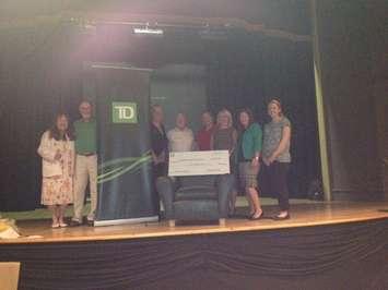 The Wingham Town Hall Theatre Committee is working to get a major project underway with help from donors.
From left to right: Pat Jamieson (committee member), David Magee (Vice chair), Kendra Prescott (Regional Sales Manager Western Ontario Region for TD), Art FitzGerald (Grant Committee chair), Pat Newson (Director of Recreation and Facilities, North Huron), Sandra Brown (TD Wealth Financial Planning), Miranda dBoer (Branch Manager, TD Wingham), Melissa Holden (Manager of customer service)