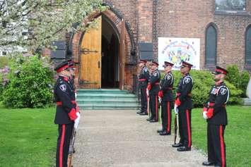 A Windsor police honour guard stands at attention outside All Saints Church before the annual Memorial and Appreciation Service, May 13, 2019. Photo by Mark Brown/Blackburn News.