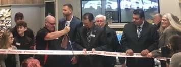 Cutting the ribbon on the new store on Toronto Street South in Markdale. (Submitted photo)