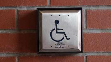 Automatic door opener button. (BlackburnNews.com File Photo by Briana Carnegie)