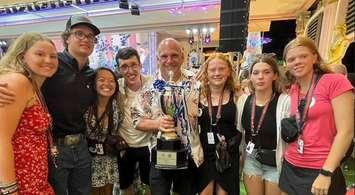 (right) Katelyn Finch, Jase Peters, Coach Katherine Messina, Coach Maxime Carrier, Junior Head Coach Geoff Johnston, Georgia Peters, Julia Chagnon, and Megan Johnston. August 2023. (Photo courtesy of Lambton Shores Dragon Boat Club via Facebook)