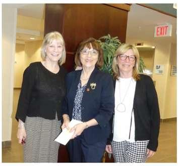 Receiving a cheque from Linda Bowers (centre) are Joan Eaglesham (left) and Peggy Zeppieri (right), members of the Huron Shores Hospice Board of Directors. (photo submitted)
