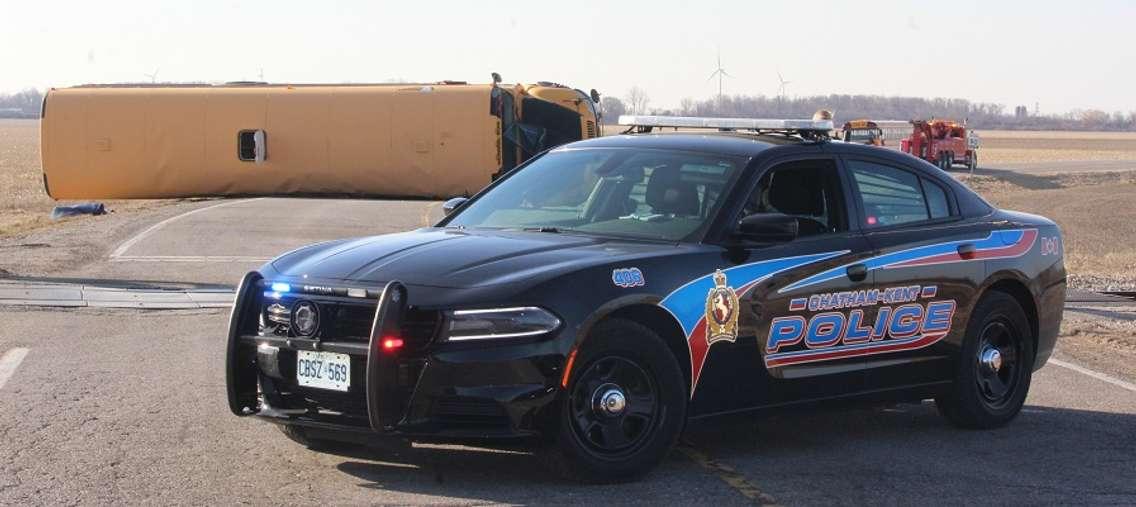 Chatham-Kent police guard the scene of a school bus crash on Merlin Rd. just west of Chatham. March 26, 2018. (Photo by Matt Weverink)