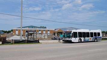 A person gets on a Sarnia Transit bus in front of the future terminal at Clearwater Arena. August 11, 2023 Blackburn Media photo by Melanie Irwin.