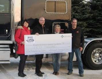 (Left to right): Jenny Hogervorst, Campaign Team Leader;  Mark Foxton, Campaign Chair;  Lyn and Jim Jutzi, owners of Brussels Transport Ltd.
(Photo submitted)