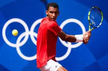 Team Canada’s Felix Auger-Aliassime returns a shot to Maximilian Marterer of Germany in tennis during the 2024 Paris Olympics Games in France on Tuesday, July 30, 2024. (Photo by Mark Blinch/COC)