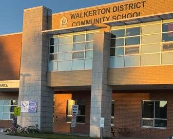 A memorial is laid at the front of Walkerton District Community School after a tragic collision. Photo by JC Coutts