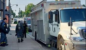 OPP officers outside an address in Walkerton, where police say they discovered a "clandestine drug laboratory". Thursday, September 12, 2024. Photo from OPP "X" account. 