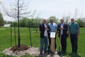 From left: Planting ceremony in Point Clark with Township of Huron-Kinloss officials Mayor Mitch Twolan, Deputy Don Murray, resident Richard Christy, and Director of Community Services Mike Fair. (Photo provided by Nicole Griffin, Communications Coordinator, Township of Huron-Kinloss)