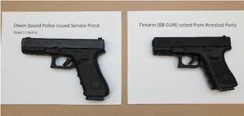 A picture comparing a police issued pistol to a replica BB gun. (photo courtesy of the Owen Sound Police Service)