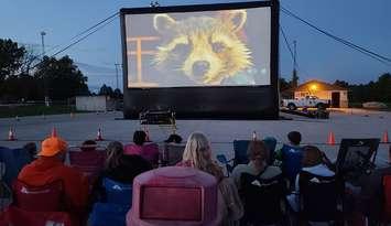 People watch a movie outdoors. Photo provided by the Township of Georgian Bluffs.