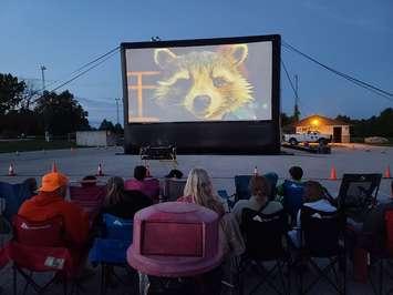 People watch a movie outdoors. Photo provided by the Township of Georgian Bluffs.