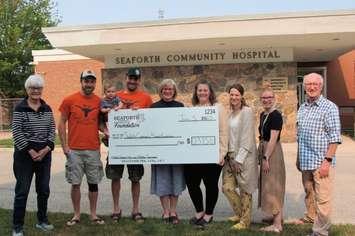 From left to right: Sheila Morton, Vice Chair Seaforth Community Hospital Foundation; Brad Van Bakel, Cooper Johnston, and Dean Johnston, representing the Young Buck’s; Mary Cardinal, Vice
President, People and Chief Quality Executive; Michele Tyndall, Manager Inpatient Unit and
Emergency Department; Kelly McDonald-Jarosz, Director Patient Care; Melissa
Wilson, Administrative Assistant; Ron Lavoie, Chair, Seaforth Community Hospital Foundation. (Photo courtesy of Huron Perth Healthcare Alliance)