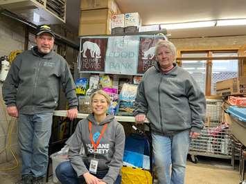 Humane Society's Erica Willick (middle) meets with Wendy and Kevin Gorman from No Empty Bowls Pet Food Bank. Photo courtesy of Humane Society London & Middlesex.
