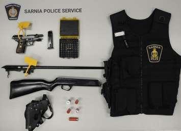 Weapons and a vest seized by Sarnia Police Service - Oct. 30/24 (Photo courtesy of Sarnia Police Service)