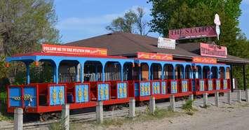 Train cars for the Port Elgin and North Shore Railroad sit in front of The Station store at the Port Elgin beach. (photo by Jordan MacKinnon)