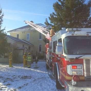 An aerial truck from Hanover assists Howick firefighters at a chimney fire in Clifford. (Photo courtesy of Shawn Edwards)