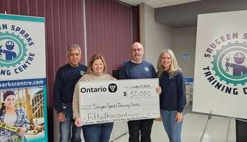 MPP Lisa Thompson presenting the cheque to (from left) Training Centre Executive Director Rob Stanley, Chairman Kenny Kilday, and Board member Lori Kohl. Photo from Rob Stanley