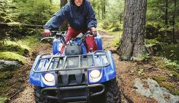 Woman riding ATV, Four wheeler