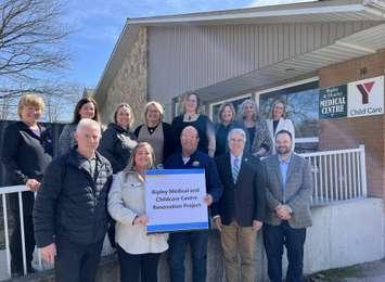 Renovations to begin at Ripley Medical and Childcare Centre.  All Partners photo: in order of appearance, left to right – Back row: Cindy Tanner, Bruce County; Tina Metcalfe, Bruce County; Candice Paul, YMCA; Cyndy Jefferson, YMCA; Pam Rantz, Kincardine Family Health Team; MPP Lisa Thompson, Ontario; Mary Rose Walden, Huron-Kinloss; Christine MacDonald, Bruce County. Front row: Mike Fair, Huron-Kinloss; Michelle Goetz, Huron-Kinloss; Mayor Don Murray, Huron-Kinloss, Warden Chris Peabody, Bruce County; Michael Pahor, NWMO. Photo from Huron-Kinloss