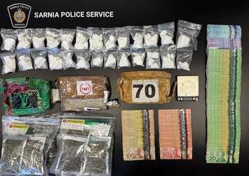 Drugs and cash seized in five-month long investigation. September 9, 2025. (Photo courtesy of Sarnia Police Service)