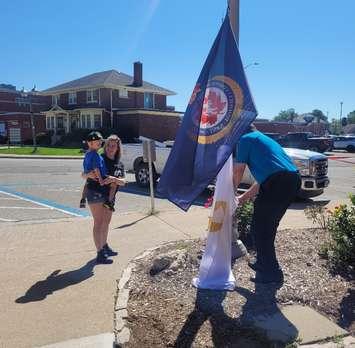 Flag raising at the Civic Centre in Chatham to raise awareness about childhood cancer. Photo from 2023 event. (Submitted by Amy Mathias)