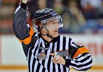 Garrett Rank refereeing the 2014 Mastercard Memorial Cup in London. -- OHL Images