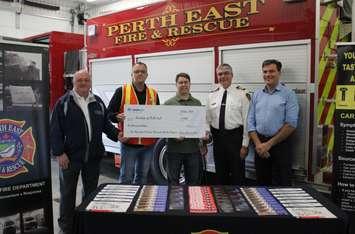 Representatives from the Township of Perth East accept a donation of $1000 from Union Gas’ Luc Cormier, for the purchase of carbon monoxide alarms at the Sebringville Fire Station on Tuesday, October 9th.
Left to Right: Councillor Jerry Smith, Field Supervisor of Utility Services (Stratford) Luc Cormier, Mayor Bob McMillan, Fire Chief Bill Hunter and Chief Administrative Officer Glenn Schwendinger (Photo provided by Stephanie Egelton, Township of Perth East)