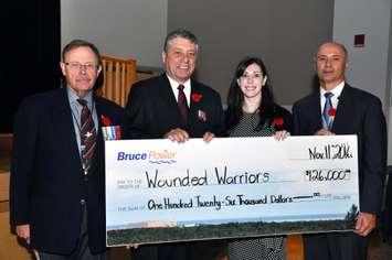Bruce Power and its partners came together to raise $126,000 for Wounded Warriors Canada at a gala on Nov. 9 in Kincardine. Presenting the cheque at Bruce Power’s Remembrance Day ceremony is Harry Hall, left, Bruce Power’s Vice President, Supply Chain, Phil Ralph, National Program Director, Wounded Warriors Canada, Crystal Pollock, Supply Chain Administrative Assistant, and Mike Rencheck, Bruce Power’s President and CEO.