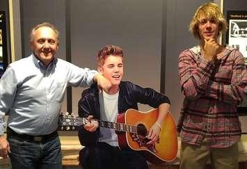 John Kastner, GM of the Stratford Perth Museum, with Justin Bieber and Bieber exhibit. (Picture courtesy of John Kastner)