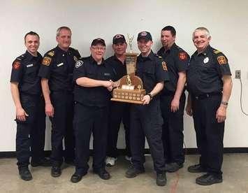 (Left to Right) James Lang, Fire Chief Mike Murphy, Bruce County President Scott Thompson, Jeff Kieffer (behind), Captain Mike Loos, Steve Lippert, Deputy Fire Chief Glen Wilhelm. (Submitted photo)