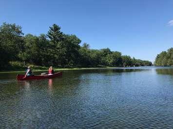 A canoe on the water. (File photo by Melanie Irwin, Blackburn News)