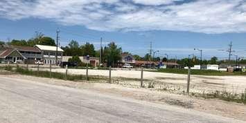 This vacant lot at the corner of Main St. & Southampton Parkway in Sauble Beach will serve as a municipal paid parking lot this summer. (Photo by Jordan Mackinnon)