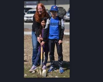 Lori, Tia and Taylor break ground on their new Habitat for Humanity home. Photo from Habitat for Humanity