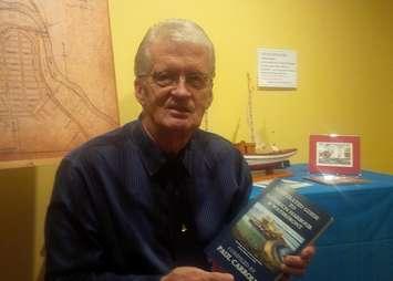 Goderich author Paul Carroll with his latest book.
Photo by Bob Montgomery